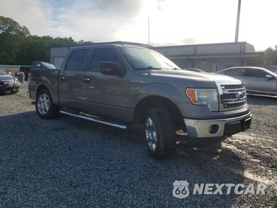 Czwarte zdjęcie samochodu z boku: 2013 FORD F150 SUPERCREW VIN:1FTFW1EF1DFB39441 - miniatura