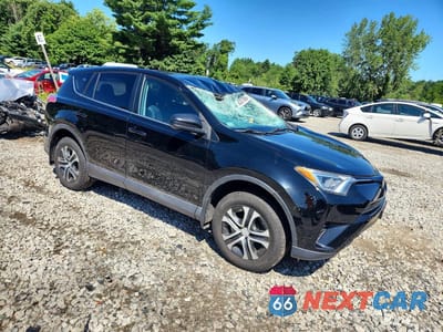 Czwarte zdjęcie samochodu z boku: 2018 TOYOTA RAV4 LE VIN:2T3BFREV2JW820433 - miniatura