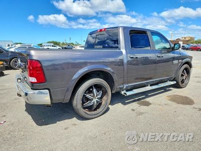 Trzecie zdjęcie samochodu z tyłu: 2014 RAM 1500 SLT VIN:1C6RR6LT6ES301851 - miniatura
