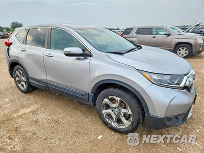 Czwarte zdjęcie samochodu z boku: 2018 HONDA CR-V EXL VIN:7FARW2H84JE013739 - miniatura