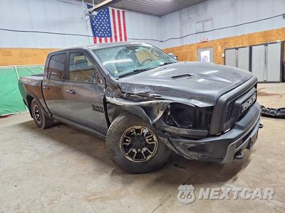 Czwarte zdjęcie samochodu z boku: 2016 RAM 1500 REBEL VIN:1C6RR7YTXGS289379 - miniatura