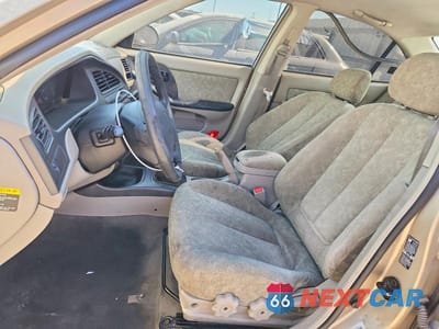 Zdjęcie 7 z 14 samochodu: 2001 HYUNDAI ELANTRA GLS VIN:KMHDN45D41U222861 - miniatura