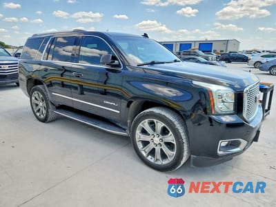 Czwarte zdjęcie samochodu z boku: 2019 GMC YUKON DENALI VIN:1GKS1CKJ9KR320773 - miniatura