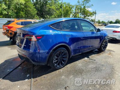 Trzecie zdjęcie samochodu z tyłu: 2024 TESLA MODEL Y VIN:7SAYGDEE8RA237151 - miniatura