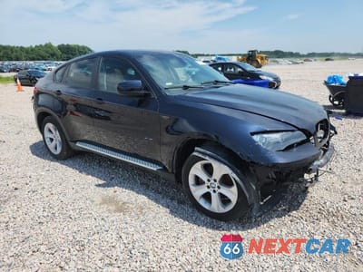 Czwarte zdjęcie samochodu z boku: 2012 BMW X6 XDRIVE35I VIN:5UXFG2C55CL779275 - miniatura