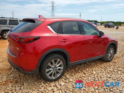 Trzecie zdjęcie samochodu z tyłu: 2021 MAZDA CX-5 GRAND TOURING RESERVE VIN:JM3KFBAY5M0434094 - miniatura