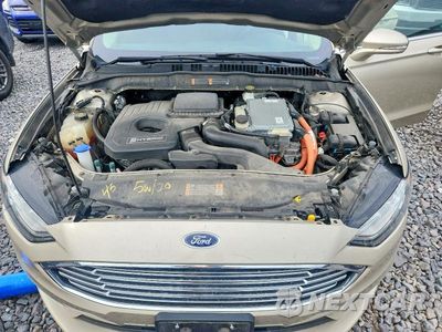 Zdjęcie 11 z 12 samochodu: 2017 FORD FUSION SE HYBRID VIN:3FA6P0LUXHR301087 - miniatura