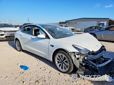 Czwarte zdjęcie samochodu z boku: 2023 TESLA MODEL 3 VIN:5YJ3E1EA0PF431097 - miniatura