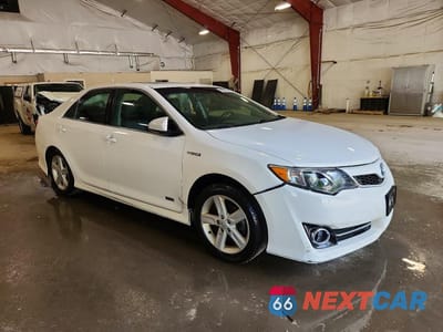 Czwarte zdjęcie samochodu z boku: 2014 TOYOTA CAMRY HYBRID SE VIN:4T1BD1FK6EU135801 - miniatura