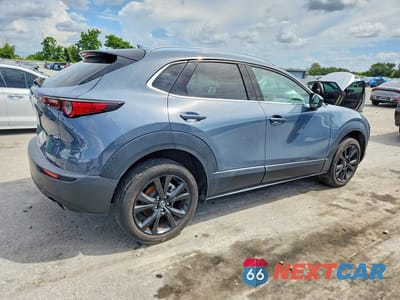 Trzecie zdjęcie samochodu z tyłu: 2022 MAZDA CX-30 PREMIUM PLUS VIN:3MVDMBEY5NM407699 - miniatura