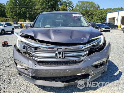 Piąte zdjęcie samochodu w środku: 2016 HONDA PILOT EXL VIN:5FNYF6H54GB038556 - miniatura