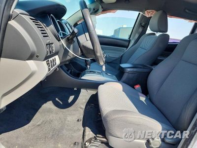 Zdjęcie 7 z 12 samochodu: 2015 TOYOTA TACOMA V6 VIN:3TMLU4EN4FM182949 - miniatura