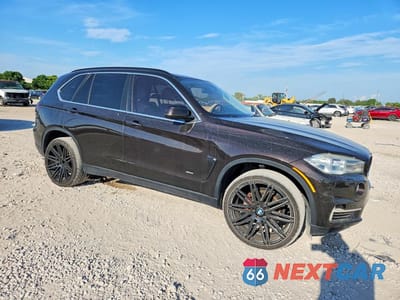 Czwarte zdjęcie samochodu z boku: 2014 BMW X5 XDRIVE35I VIN:5UXKR0C58E0K43406 - miniatura