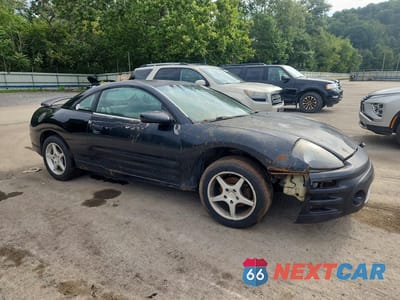 Czwarte zdjęcie samochodu z boku: 2003 MITSUBISHI ECLIPSE GS VIN:4A3AC44G53E187380 - miniatura