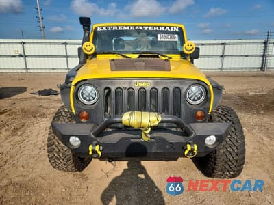 Piąte zdjęcie samochodu w środku: 2011 JEEP WRANGLER SPORT VIN:1J4AA2D12BL537741 - miniatura