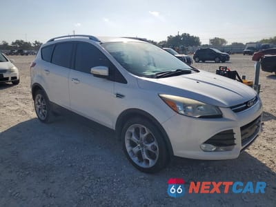 Czwarte zdjęcie samochodu z boku: 2014 FORD ESCAPE TITANIUM VIN:1FMCU0JX6EUC44471 - miniatura