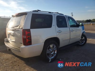 Trzecie zdjęcie samochodu z tyłu: 2010 CHEVROLET TAHOE K1500 LTZ VIN:1GNUKCE0XAR184809 - miniatura