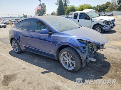 Czwarte zdjęcie samochodu z boku: 2023 TESLA MODEL Y VIN:7SAYGDED8PF960571 - miniatura