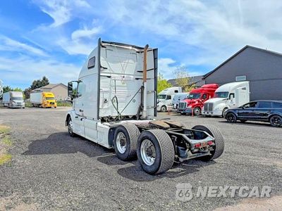 Trzecie zdjęcie samochodu z tyłu: 2013 VOLVO VN VNL TRUCK CHASSIS TRUCK CAB AND CHASSIS VIN:4V4NC9EHXDN136441 - miniatura