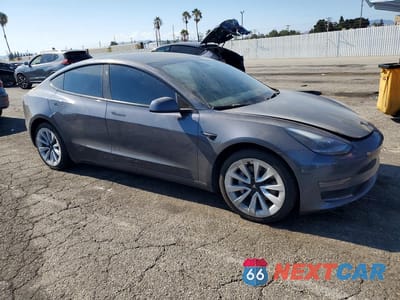 Czwarte zdjęcie samochodu z boku: 2022 TESLA MODEL 3 VIN:5YJ3E1EB7NF166796 - miniatura