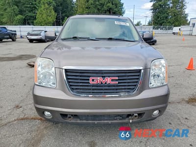 Piąte zdjęcie samochodu w środku: 2011 GMC YUKON SLT VIN:1GKS2CE01BR238178 - miniatura