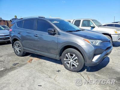 Czwarte zdjęcie samochodu z boku: 2018 TOYOTA RAV4 LE VIN:2T3ZFREV8JW488979 - miniatura