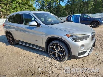 Czwarte zdjęcie samochodu z boku: 2017 BMW X1 XDRIVE28I VIN:WBXHT3C34H5F79581 - miniatura
