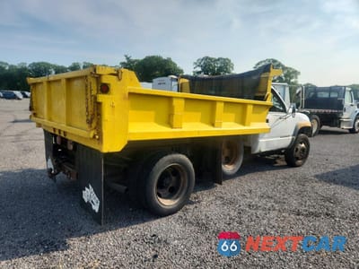 Trzecie zdjęcie samochodu z tyłu: 1999 GMC SIERRA DUMP TRUCK VIN:1GDKC34FXXF039004 - miniatura