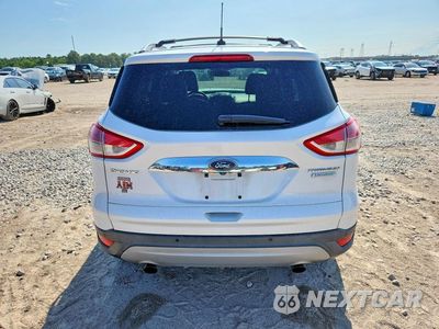 Zdjęcie 6 z 12 samochodu: 2016 FORD ESCAPE TITANIUM VIN:1FMCU0J91GUA20691 - miniatura