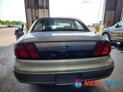 Zdjęcie 6 z 12 samochodu: 1996 CHEVROLET LUMINA VIN:2G1WL52M7T1196163 - miniatura
