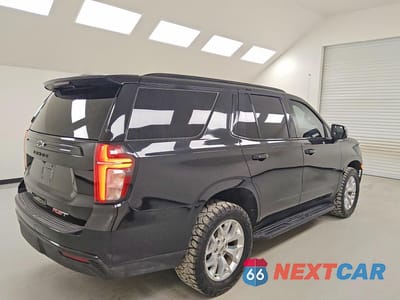 Trzecie zdjęcie samochodu z tyłu: 2023 CHEVROLET TAHOE C1500 RST VIN:1GNSCRKD0PR446876 - miniatura