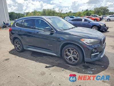 Czwarte zdjęcie samochodu z boku: 2018 BMW X1 SDRIVE28I VIN:WBXHU7C35J5H41390 - miniatura