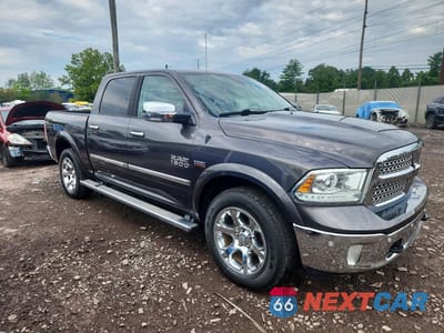 Czwarte zdjęcie samochodu z boku: 2015 RAM 1500 LARAMIE VIN:1C6RR7NT6FS564409 - miniatura