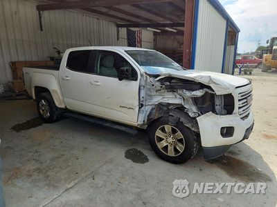 Czwarte zdjęcie samochodu z boku: 2016 GMC CANYON SLE VIN:1GTG6CE39G1197028 - miniatura