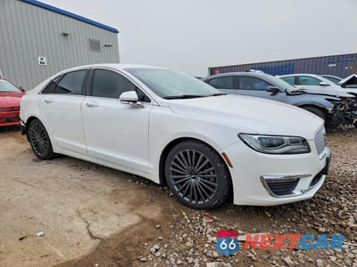 Czwarte zdjęcie samochodu z boku: 2017 LINCOLN MKZ RESERVE VIN:3LN6L5EC0HR657437 - miniatura