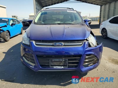 Piąte zdjęcie samochodu w środku: 2014 FORD ESCAPE TITANIUM VIN:1FMCU9J98EUB09191 - miniatura