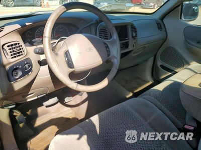 Zdjęcie 8 z 12 samochodu: 2001 FORD F150 VIN:3FTRF17W21MA65999 - miniatura
