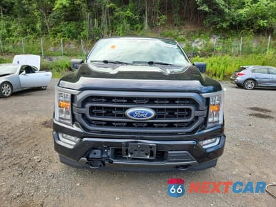 Piąte zdjęcie samochodu w środku: 2021 FORD F150 SUPERCREW VIN:1FTFW1E81MFB90620 - miniatura