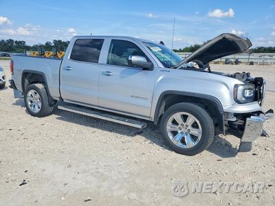 Czwarte zdjęcie samochodu z boku: 2018 GMC SIERRA K1500 SLT VIN:3GTU2NEC3JG623685 - miniatura