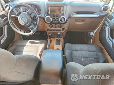 Zdjęcie 8 z 13 samochodu: 2011 JEEP WRANGLER UNLIMITED SAHARA VIN:1J4HA5H11BL574984 - miniatura