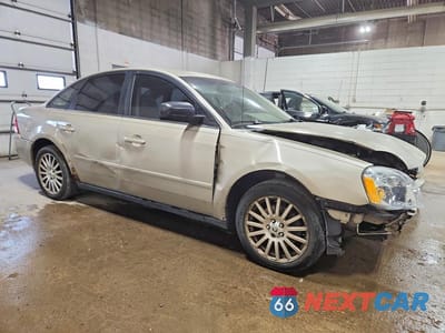 Czwarte zdjęcie samochodu z boku: 2006 MERCURY MONTEGO PREMIER VIN:1MEFM421X6G606299 - miniatura