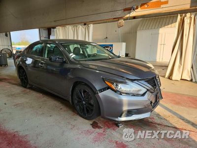 Czwarte zdjęcie samochodu z boku: 2018 NISSAN ALTIMA 2.5 SR VIN:1N4AL3AP5JC258268 - miniatura