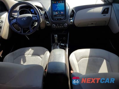 Zdjęcie 8 z 12 samochodu: 2015 HYUNDAI TUCSON GLS VIN:KM8JT3AF6FU037602 - miniatura