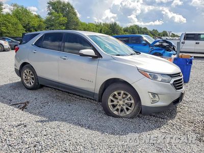 Czwarte zdjęcie samochodu z boku: 2018 CHEVROLET EQUINOX LT VIN:3GNAXJEV8JL361174 - miniatura
