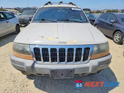 Piąte zdjęcie samochodu w środku: 1999 JEEP GRAND CHEROKEE LAREDO VIN:1J4GW58S9XC682248 - miniatura
