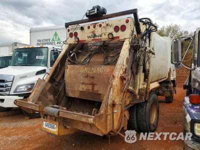 Trzecie zdjęcie samochodu z tyłu: 1999 UD UD2300 REFUSE TRUCK VIN:JNALC43H4XGN50061 - miniatura
