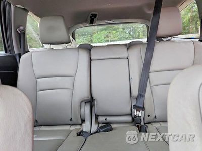 Zdjęcie 10 z 13 samochodu: 2017 HONDA PILOT TOURING VIN:5FNYF5H95HB014832 - miniatura