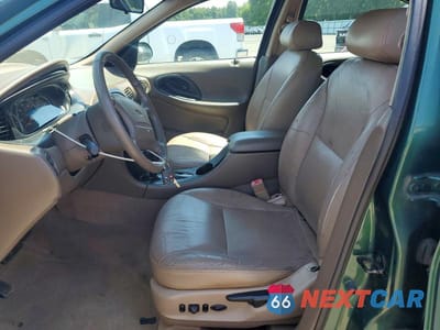 Zdjęcie 7 z 13 samochodu: 1999 FORD TAURUS SE COMFORT VIN:1FAFP58S4XG275225 - miniatura