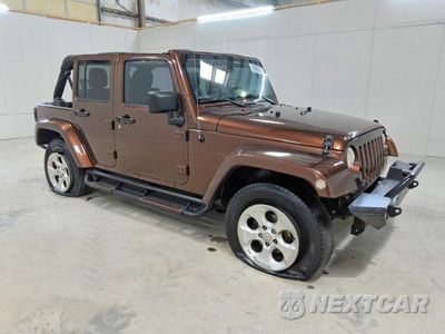 Czwarte zdjęcie samochodu z boku: 2013 JEEP WRANGLER UNLIMITED SAHARA VIN:1C4BJWEG0DL698502 - miniatura