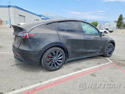 Trzecie zdjęcie samochodu z tyłu: 2022 TESLA MODEL Y VIN:7SAYGDEF9NF387615 - miniatura